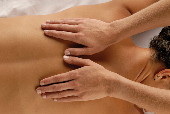 Young Woman Receiving a Back Massage